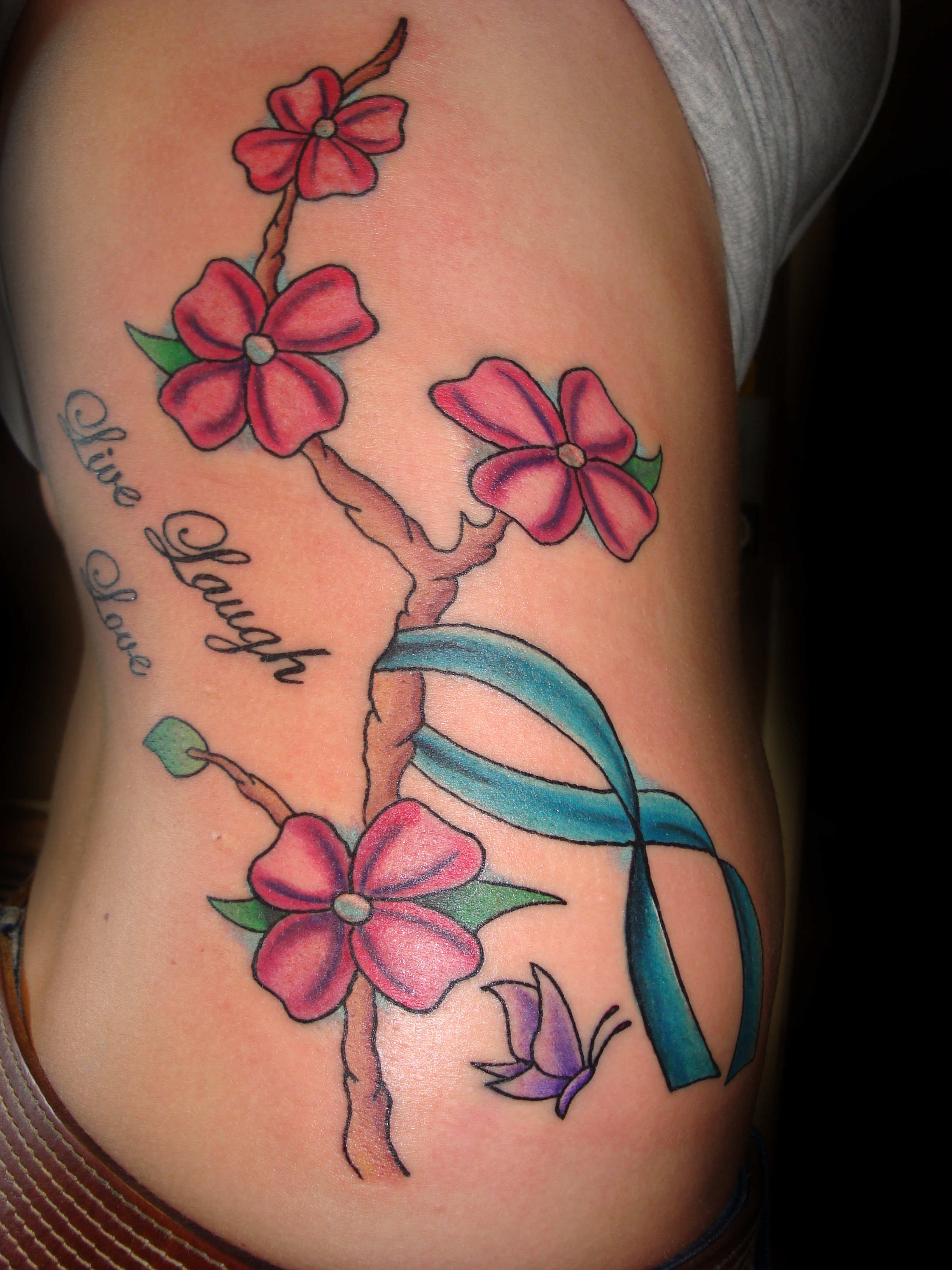 Cancer Ribbon Tattoos with Flowers.